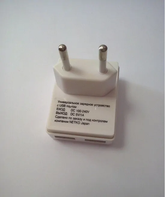 Домашнее универсальное зарядное устройство USB, 2 порта, 5В, выходная сила тока 1А, белый, п/пакет, Netko РАСПРОДАЖА